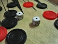 Backgammon dice and chips Royalty Free Stock Photo