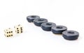 Backgammon dice and pieces Royalty Free Stock Photo
