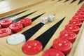 Backgammon game and dices on game board. Closeup