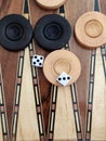 Wooden backgammon board game of pearl inlaid on brown background.