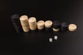 Backgammon. Board game. White cubes and chips on a blackboard.  Dice on backgammon board game. Selective focus. Playing leisure Royalty Free Stock Photo