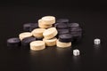 Backgammon. Board game. White cubes and chips on a blackboard.  Dice on backgammon board game. Selective focus. Playing leisure Royalty Free Stock Photo
