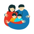 Asian ethnicity family embracing. Mother, father, daughter and son together.