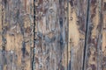 Close up of a weathered unfinished wooden vertical planks