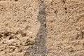 old grunge and weathered light warm hearth calcareous tuff stone wall with texture extreme close up background