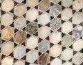 elegant antique multi tone colored roughmarble tiles with white border background floor close up background