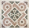 antique close up of pale and multi color geometrically intricate patterned marble mosaic tile floor background