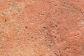 semi smooth pale salmon orange stucco wall textured background close up background Royalty Free Stock Photo