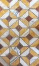 vertical geometrical multi earth color patterned historical and detailed marble tile floor background Royalty Free Stock Photo
