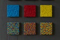 contemporary bright sample of solide light blue, red and yellow colored mosaic tiles with differente combinations wall background