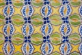 close up of historical vibrant multicolor ceramic tiles with geometric decorative patterns floor background