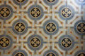 geometrical and symmetrical decorated square colorful ceramic tiles background floor close up
