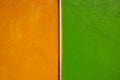 neon bright smooth Mango Tango and dark chartreuse green red stucco wall texture background