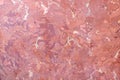close up of pale multi tone pinkish seamless patterned marble stone wall background