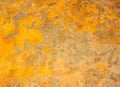 weathered and rough multi tone sunburst yellow stucco wall texture background Royalty Free Stock Photo