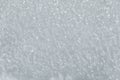 even sparkling white pure snow crystal flakes background close up background Royalty Free Stock Photo
