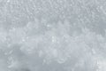even sparkling white pure snow crystal flakes background extreme close up Royalty Free Stock Photo