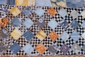 geometric diamond shaped marbles tiles patterns alternating colorful with checker ones floor close up