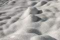 sparkling white pure snow background with centered small dunes Royalty Free Stock Photo