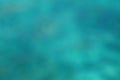 Background abstract blurry turquoise water surface of the sea Royalty Free Stock Photo