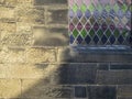 Background abstract detail. Church wall and stained glass window. Royalty Free Stock Photo