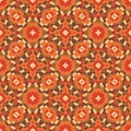 Background abstract geometric style. Seamless pattern design. Red, orange & brown colors. Exotic boho trend backdrop. Vector Royalty Free Stock Photo