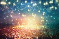 Background of abstract glitter lights. blue, gold and black. de focused Royalty Free Stock Photo