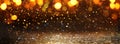 Background of abstract glitter lights. gold and black. de-focused. banner Royalty Free Stock Photo