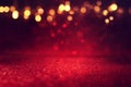 Background of abstract red, gold and black glitter lights. defocused Royalty Free Stock Photo