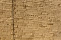 Background of the ancient brick wall in a Karnak temple. Luxor, Egypt Royalty Free Stock Photo