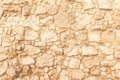 Background of ancient brick wall. Texture of old amphitheater stone. Texture of an ancient brick wall made of sandstone. Royalty Free Stock Photo