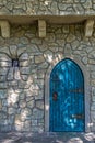 Background with ancient door to the castle and small window Royalty Free Stock Photo