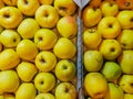 A background of Apples in a drawer. Yellow apple Raw fruit and vegetable organic fresh produce Royalty Free Stock Photo