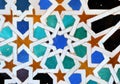 Background of arab tiles, islamic pattern mosaic. Palace of Alhambra in Granada, Andalusia, Spain