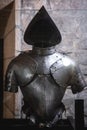 Background with armour of the medieval knight. Metal protection of the soldier. Steel Plate. Rivets and engraving, dark light Royalty Free Stock Photo