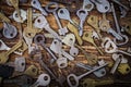 Background of assorted old multi-colored metal antique keys of different shapes. Home security concept Royalty Free Stock Photo