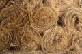 Background of bales hay stacked on each other