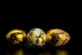 Gold Easter egg on black background