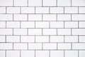 Background for a bathroom, a toilet from a classic white ceramic tile