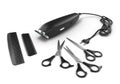 background for beauty clippers scissors and combs are laid around on white