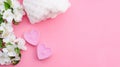 Background for beauty salons for valentines day, two pink heart candles on a pink background with copy space Royalty Free Stock Photo