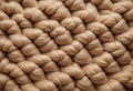 background of beige and brown knitting texture made of wool Royalty Free Stock Photo