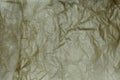 Background of Beige Color Crease and Crumpled Paper Surface Royalty Free Stock Photo