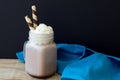 Background with big jar of hot chocolate with whipped cream Royalty Free Stock Photo