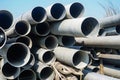 Background of big plastic pipes used at the building site.The many big pipes on the ground. PVC pipes bacground Royalty Free Stock Photo