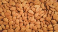 Background of big raw peeled almonds.