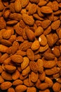 big raw peeled almonds situated arbitrarily Royalty Free Stock Photo