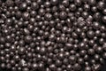 Background of black balls of different sizes. graphic resource