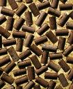 Wine bottle corks arranged on cork background Royalty Free Stock Photo