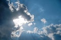 Background of black clouds in a dramatic sky with breaking rays of the sun, copy space Royalty Free Stock Photo